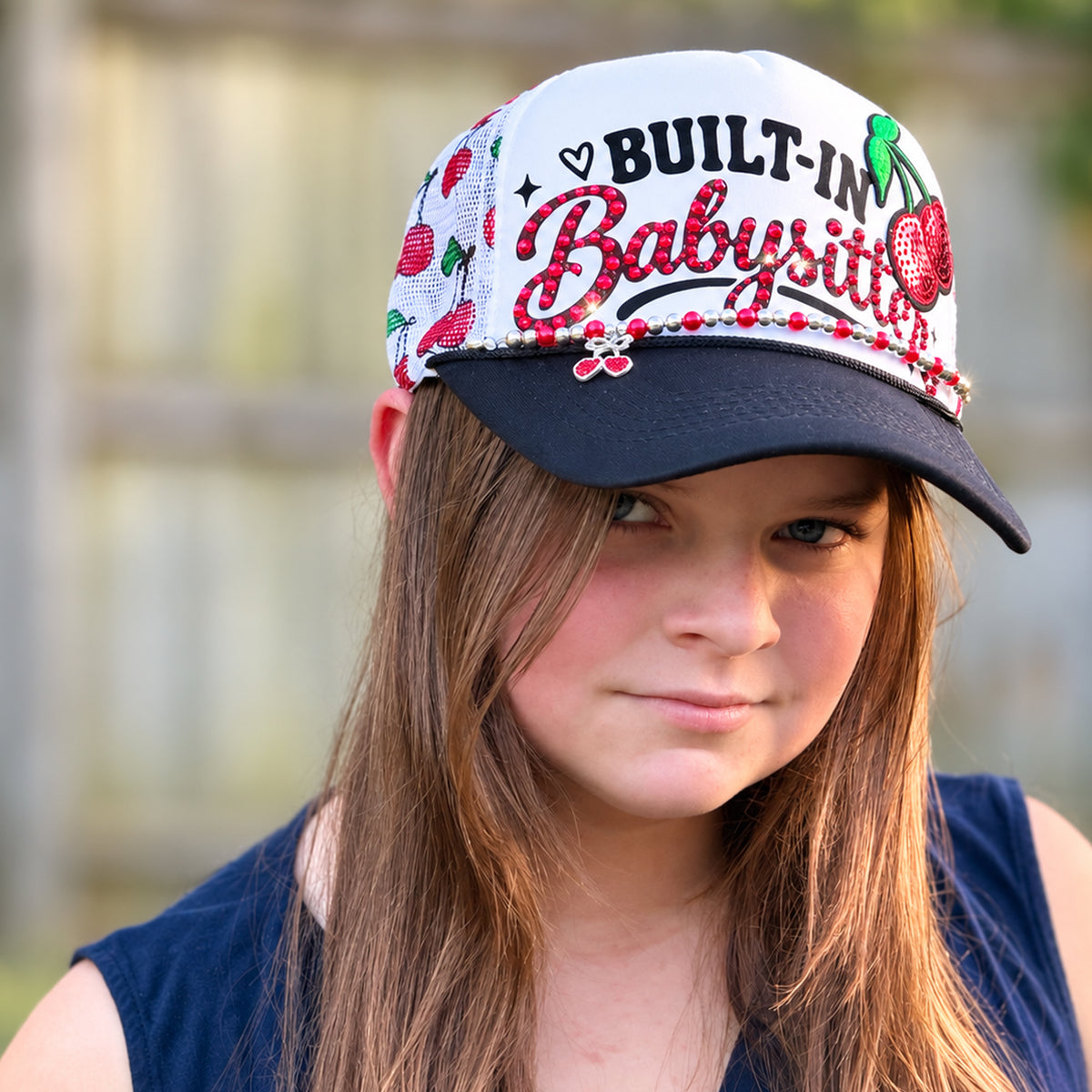 Built-In Babysitter Rhinestone Cherry Trucker Hat